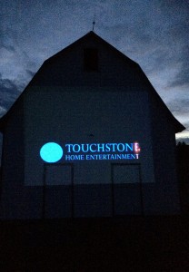 Enjoy a movie outside using our barn as your screen!